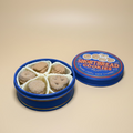 Shortbread cookie tin fidget clicker on tan background