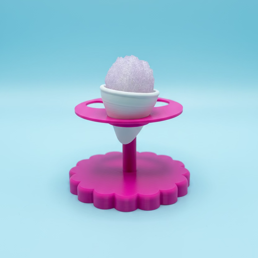 Pink stand with a white bowl containing a purple textured object on a wooden surface.